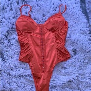 Orange satin body suit